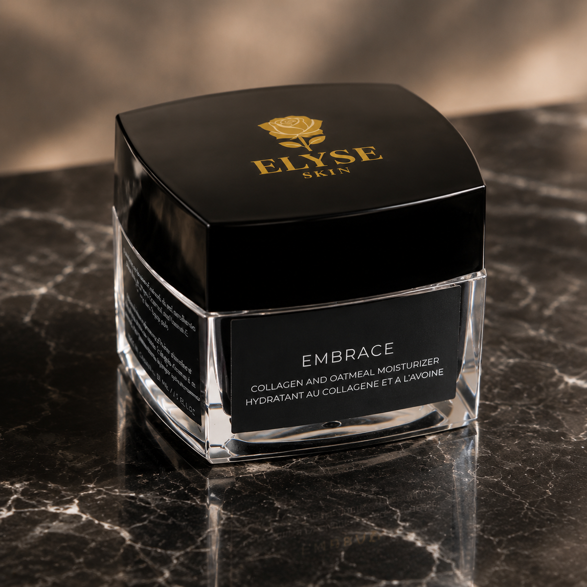 A jar of ELYSE SKIN Embrace Collagen and Oatmeal Moisturizer, featuring a black lid with gold branding and a clear glass container, set on a dark marble surface.
